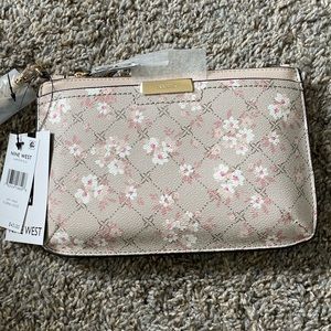 Nine West designer Lawson wristlet with Gold-tone hardware, Top zipper, CC slots